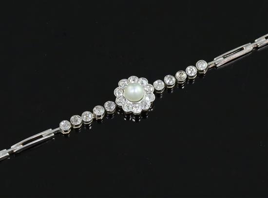 A mid 20th century 14ct gold, diamond and cultured pearl cluster set bracelet, 18cm.